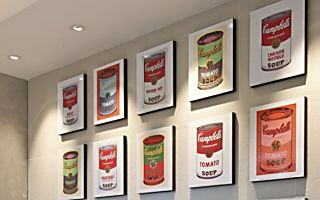 Displays of art and favourite photos can help make a house feel more like a home